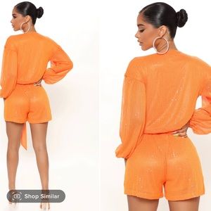 Orange sequins romper from Fashion Nova. Size 1x. Never worn.
